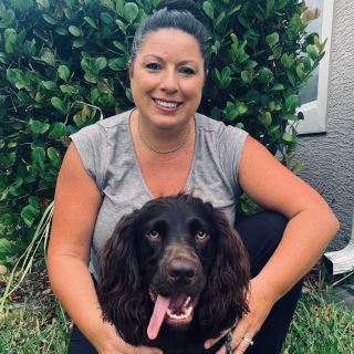 ally smiling with dog